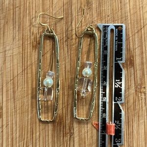 Hand crafted gold tone earrings w/crystal and pearl drop.
